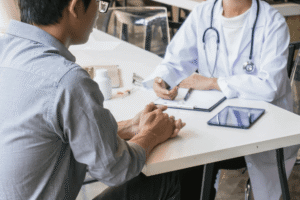 Patient consulting a doctor about medication-assisted treatment