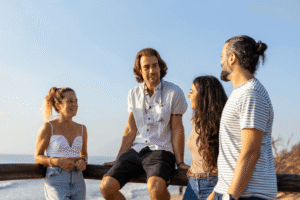Group of friends laughing together while enjoying life in recovery
